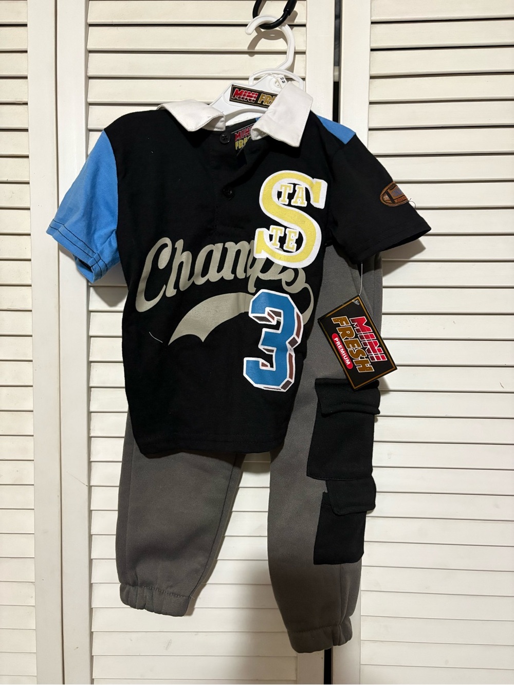 Champs Graphic Polo Shirt for Kids - Black with Blue Accents
